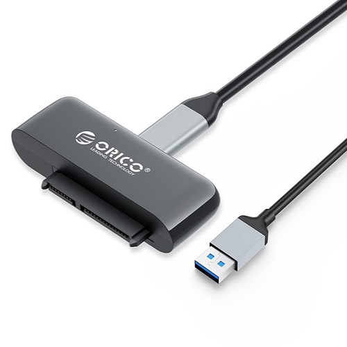 2,5 tuuman SATA–USB 3.0 -sovitin ORICO UTS3-3A datakaapelilla 1 m (kuva varten) 2,5 tuuman SATA–USB 3.0 -sovitin ORICO UTS3-3A datakaapelilla 1 m